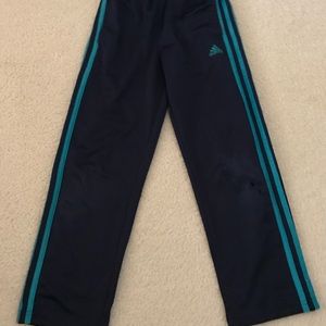 Adidas Navy pants with teal stripes